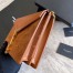 Saint Laurent Cassandra Clasp Bag In Brown Suede